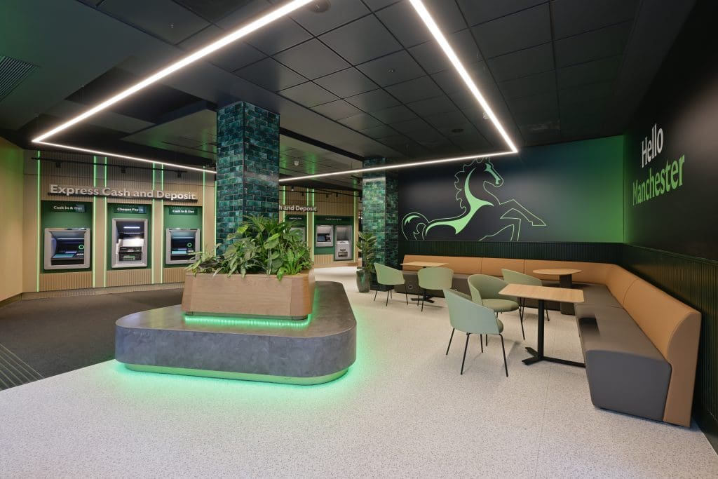 Lloyds Bank Manchester interior showing ATM zone and customer seating within a modern experiential design environment